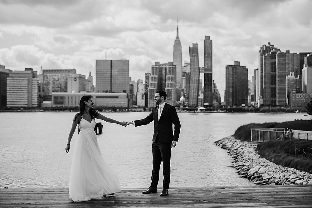 bride and groom with NYC skyline